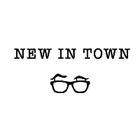 NEW IN TOWN logo